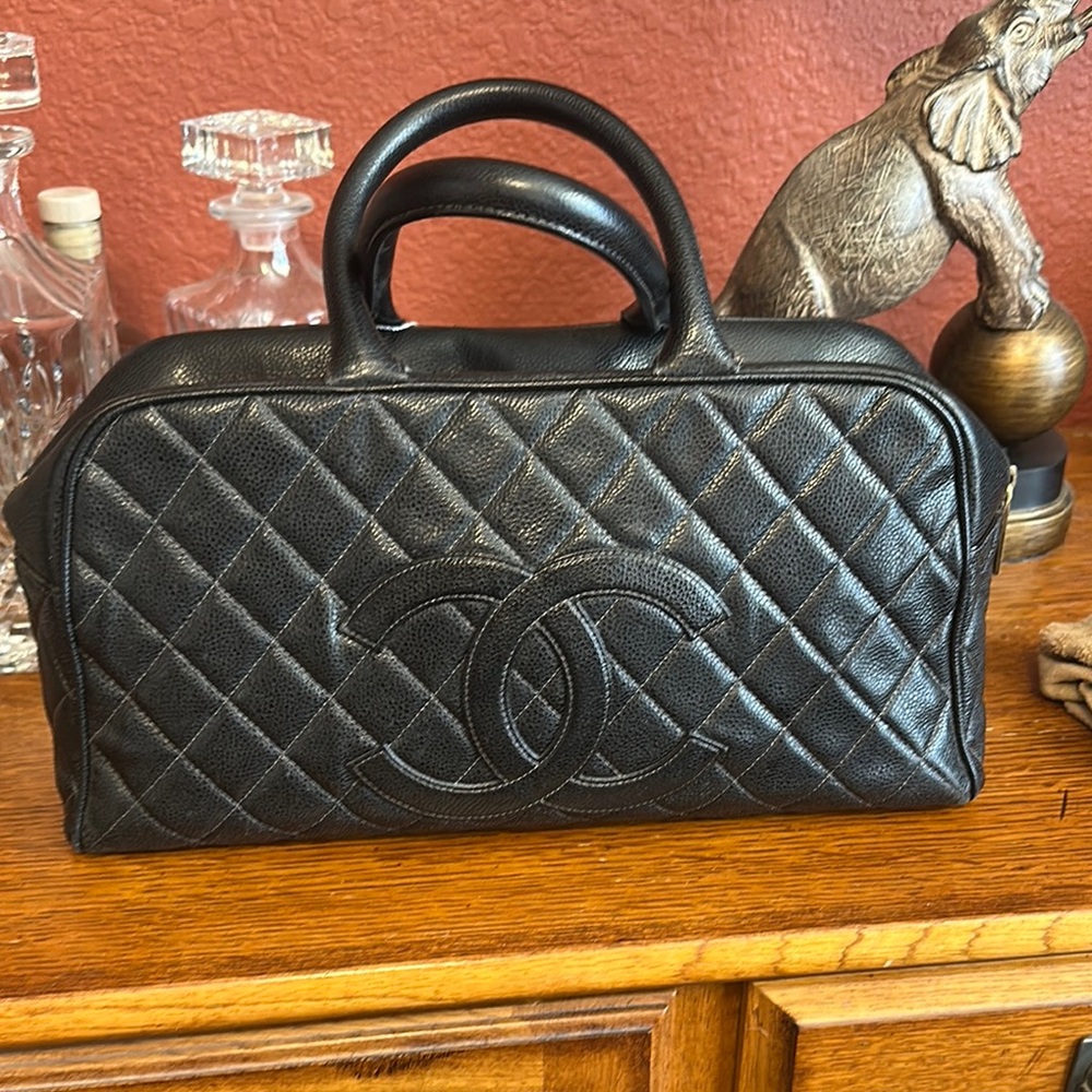 Chanel Black Quilted leather black bowling handbag